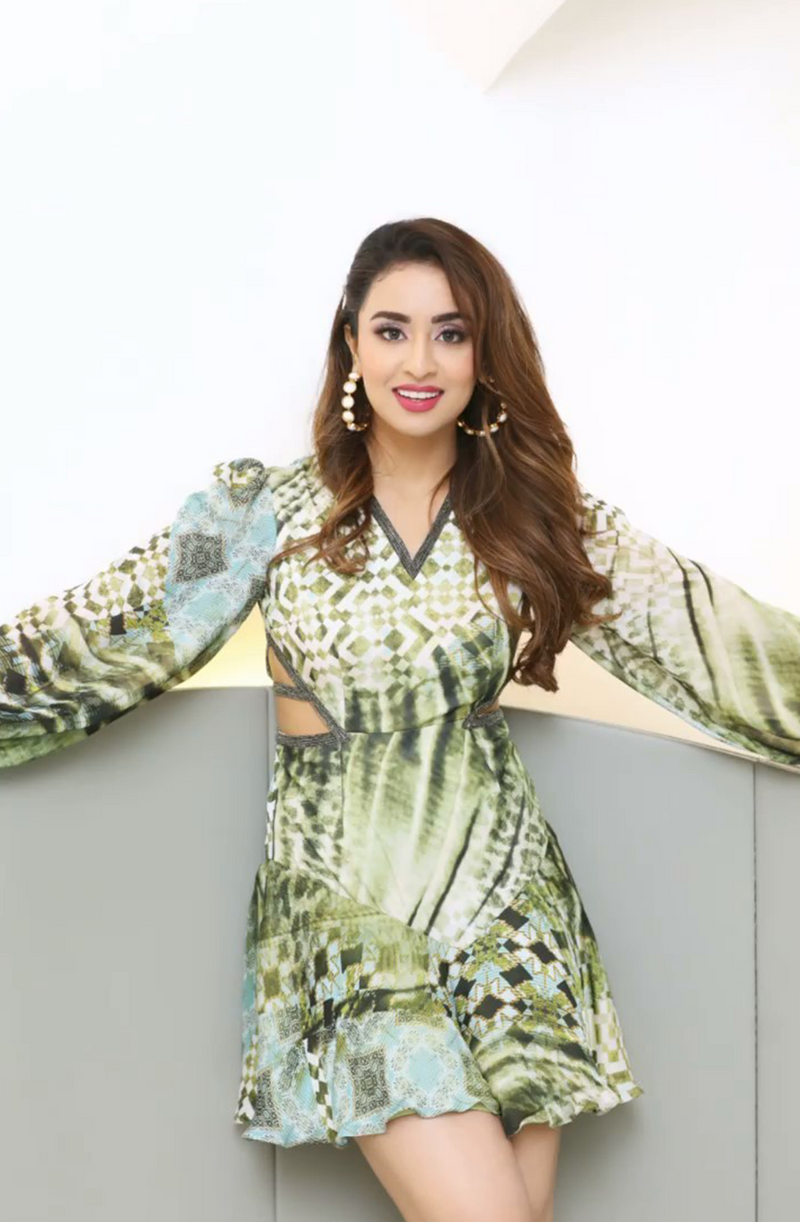 Musskan Sethi in Green Abstract Print Cut Out Dress