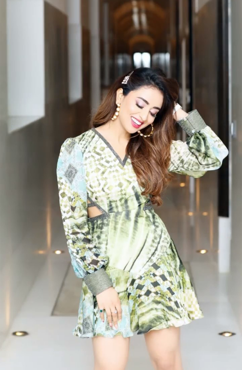 Musskan Sethi in Green Abstract Print Cut Out Dress