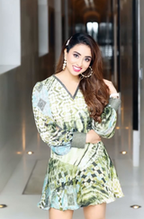 Musskan Sethi in Green Abstract Print Cut Out Dress